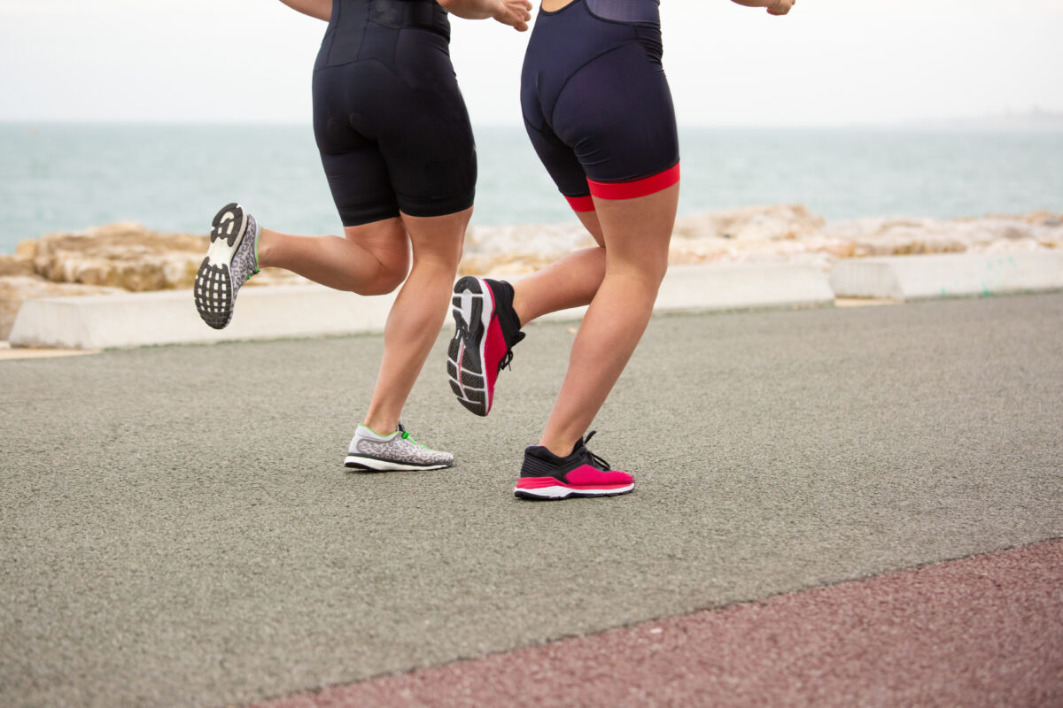 Cropped Shot Women Running Sea Shore 1200x800